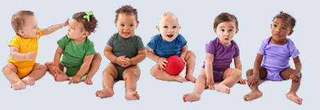 Babies wearing colorful clothing posing for a group picture.